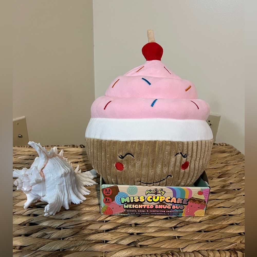 Squishmallows “Miss Cupcake” weighted snug bud